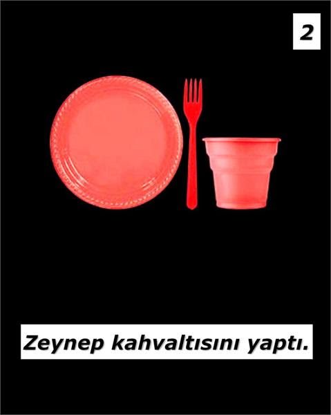 Red plate, fork and cup on black background