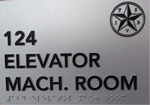Door plate with room number and name of room in raised print and braille