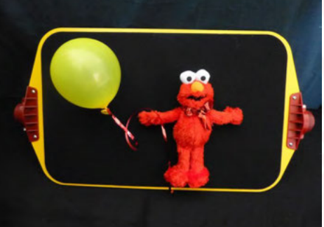 elmo with balloon