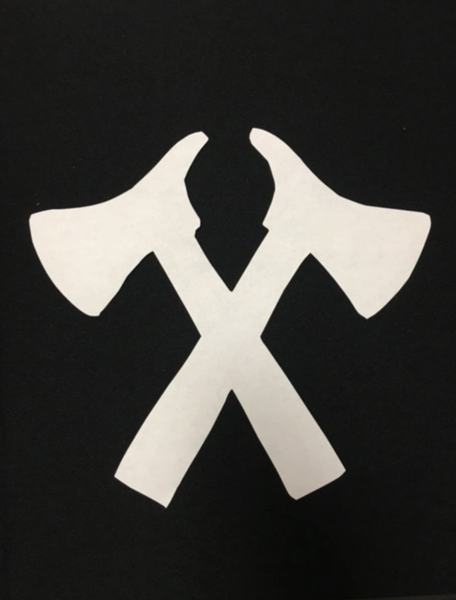 Two white axes on black background