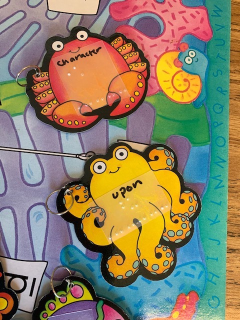 Colorful fish with braille contractions: character and upon