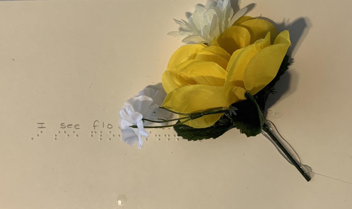Artificial flowers with braille text 