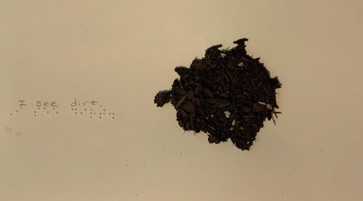 Dirt with braille text 