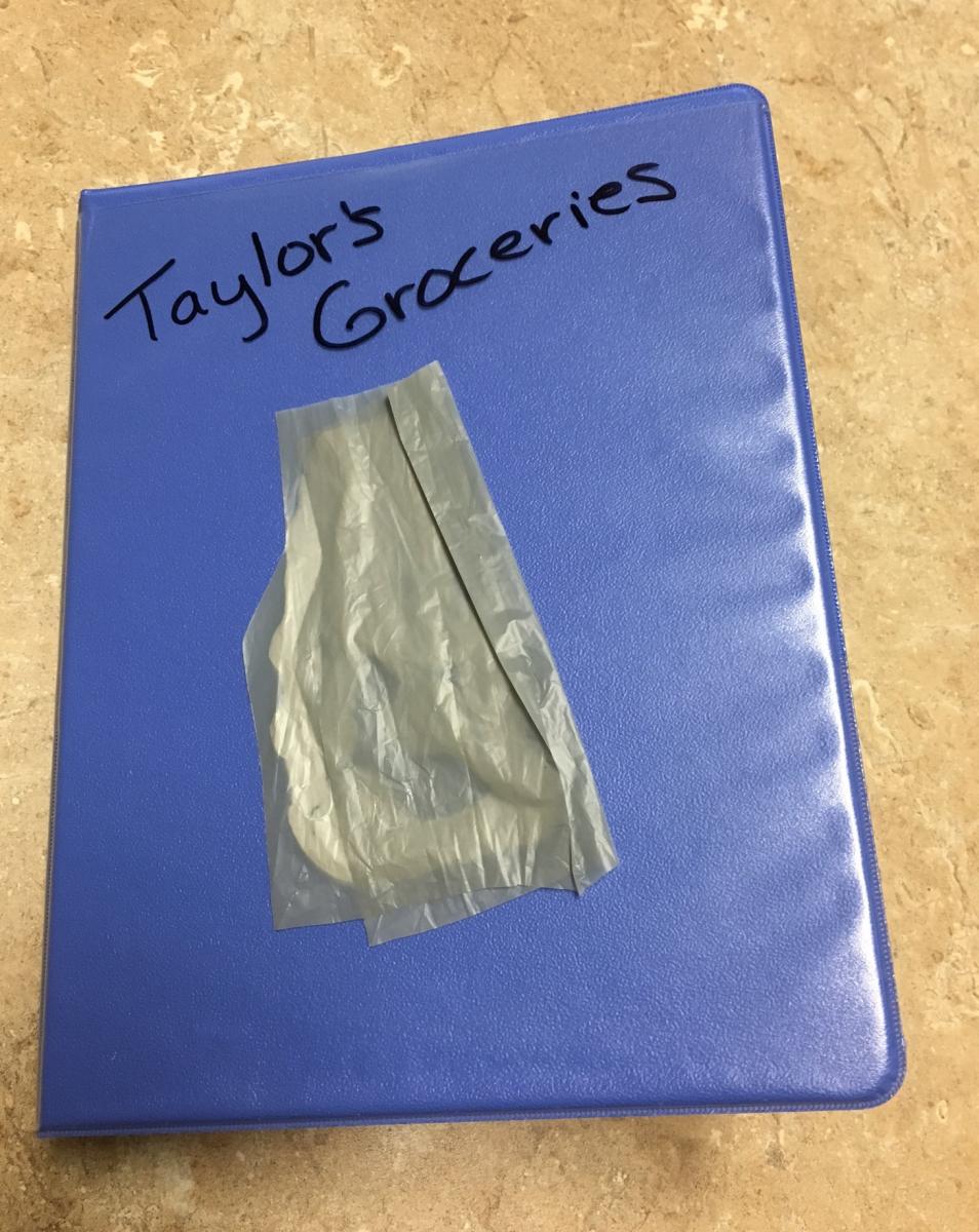 a small binder labeled 