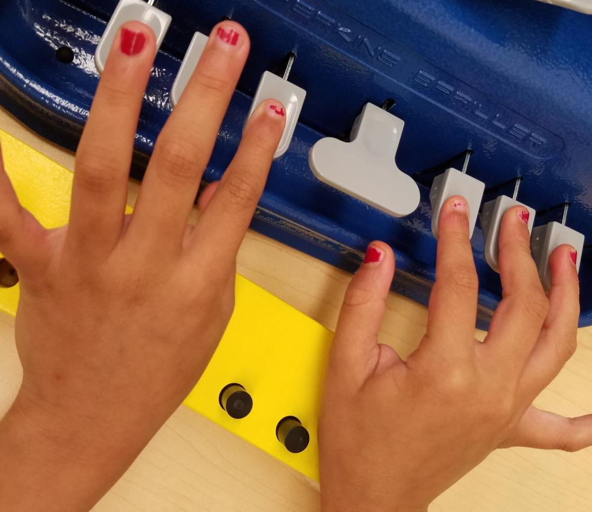 Finger positions on a braillewriter