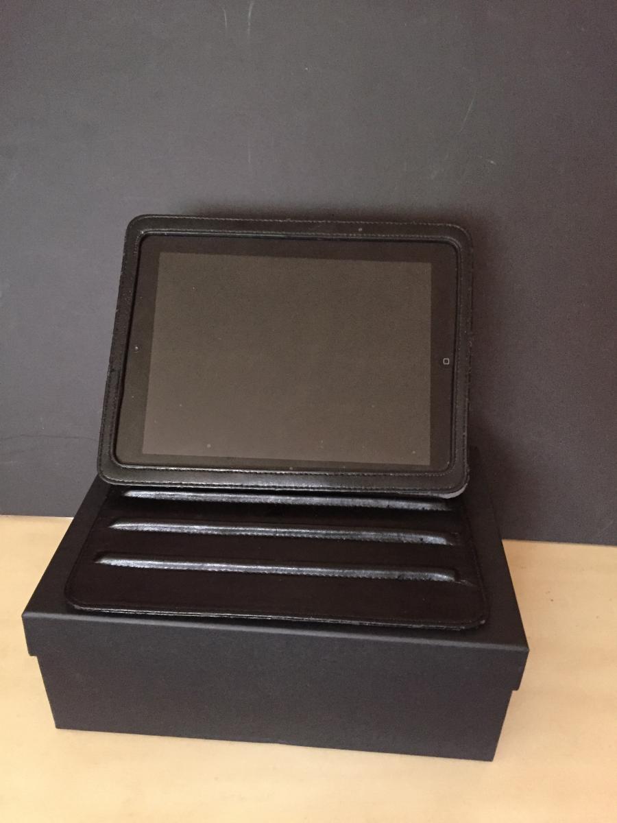 Black iPad case and black background