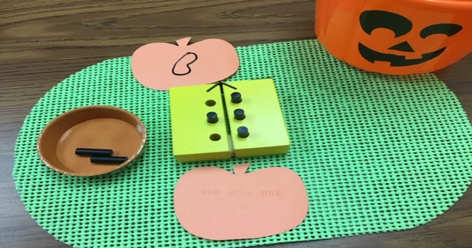 Fall theme jumping bean game with pumpkins