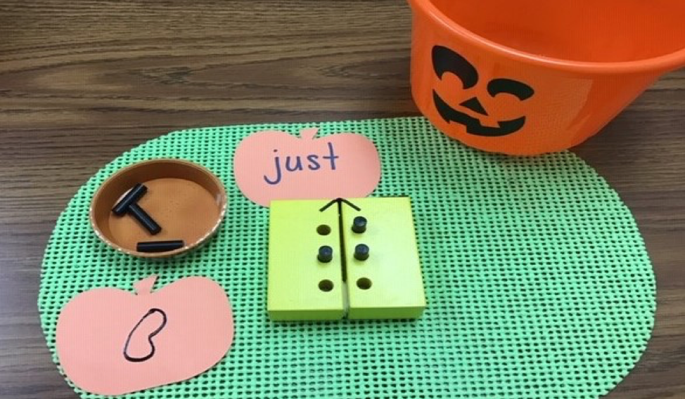 Fall theme jumping bean game with pumpkins
