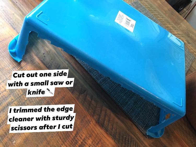 Plastic basket with one side cut out