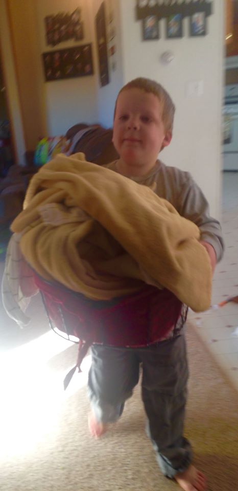 Boy carrying the laundry