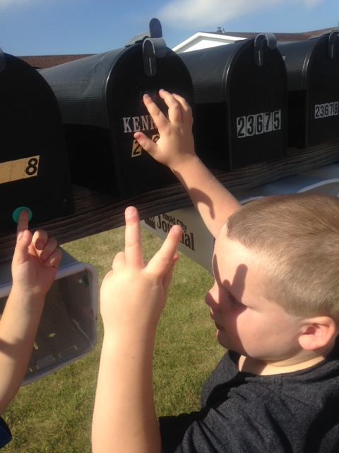 Reading braille on mailbox and signing