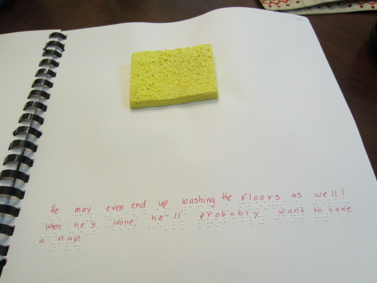 a yellow sponge on a page with text