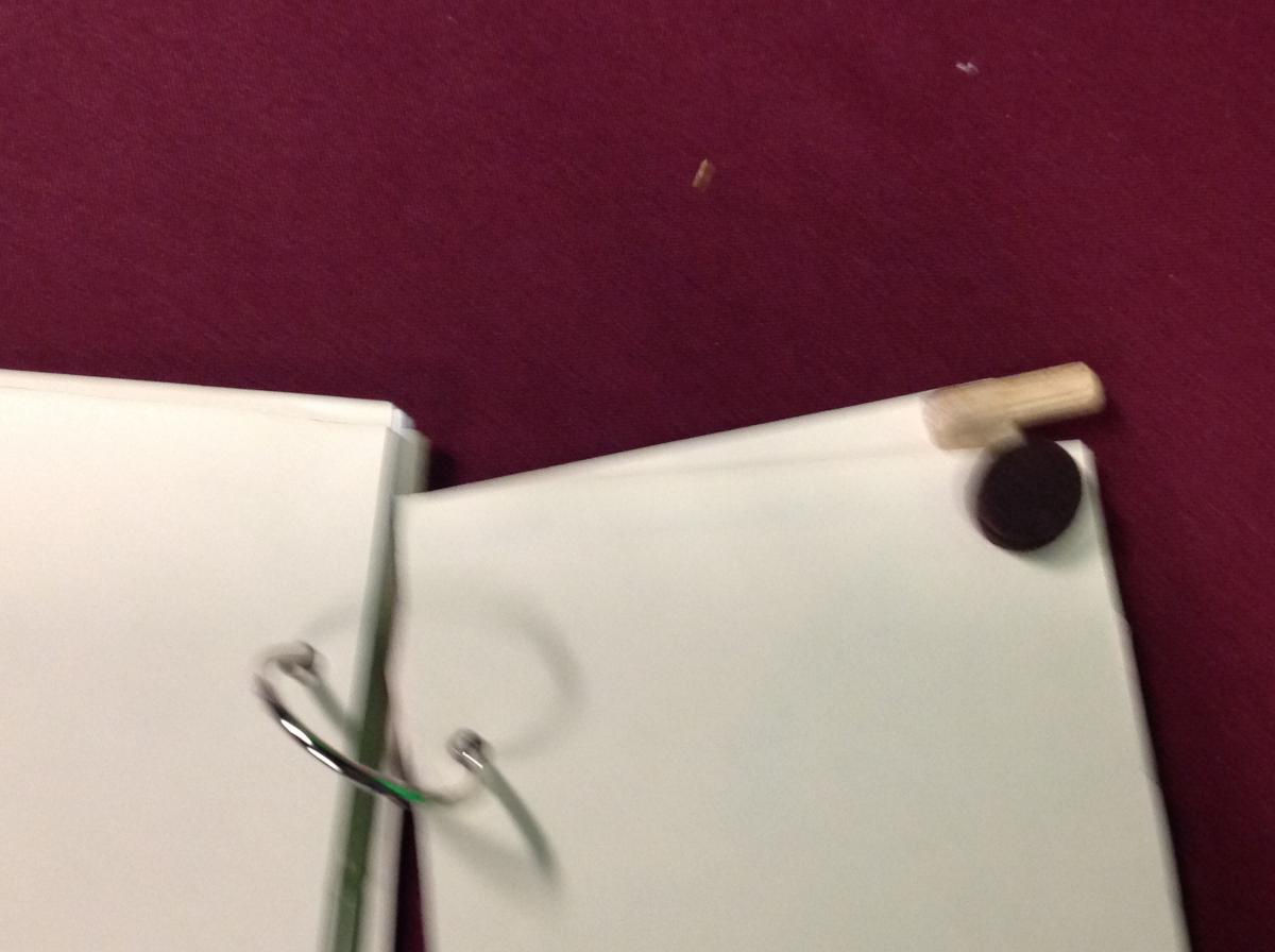 Page fluffer with foam dot & wooden dowel Page fluffer