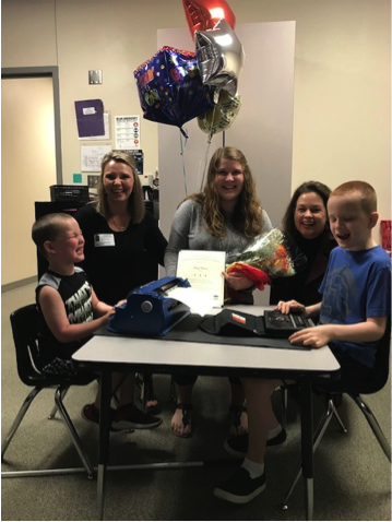 Paige with some of her students