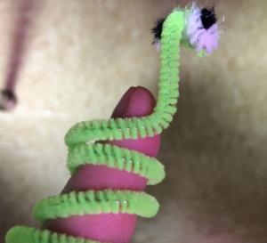 Finger with pipe cleaner on it