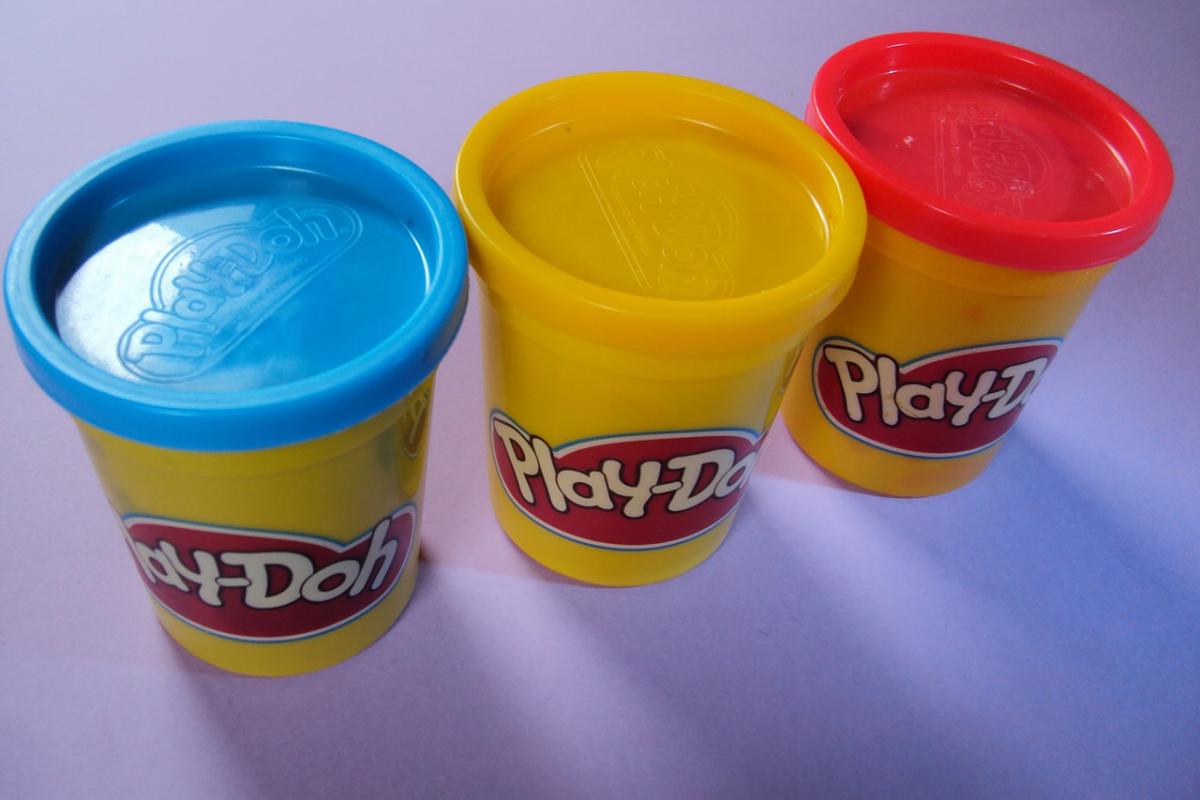 Three cans of Play-doh