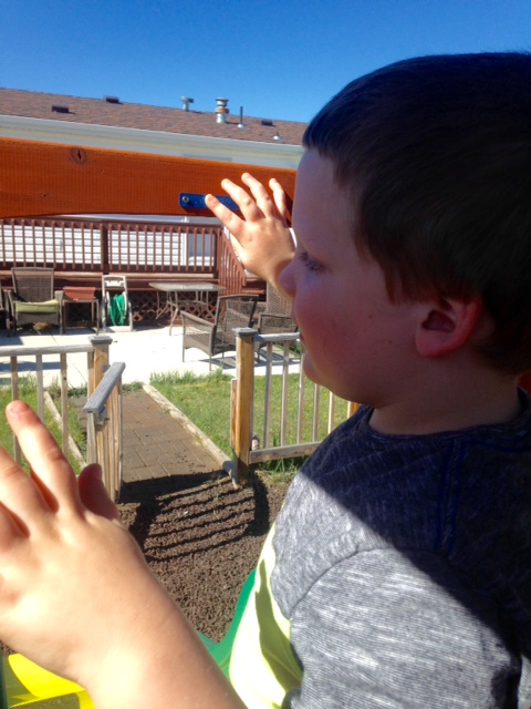 Reading braille label on playground