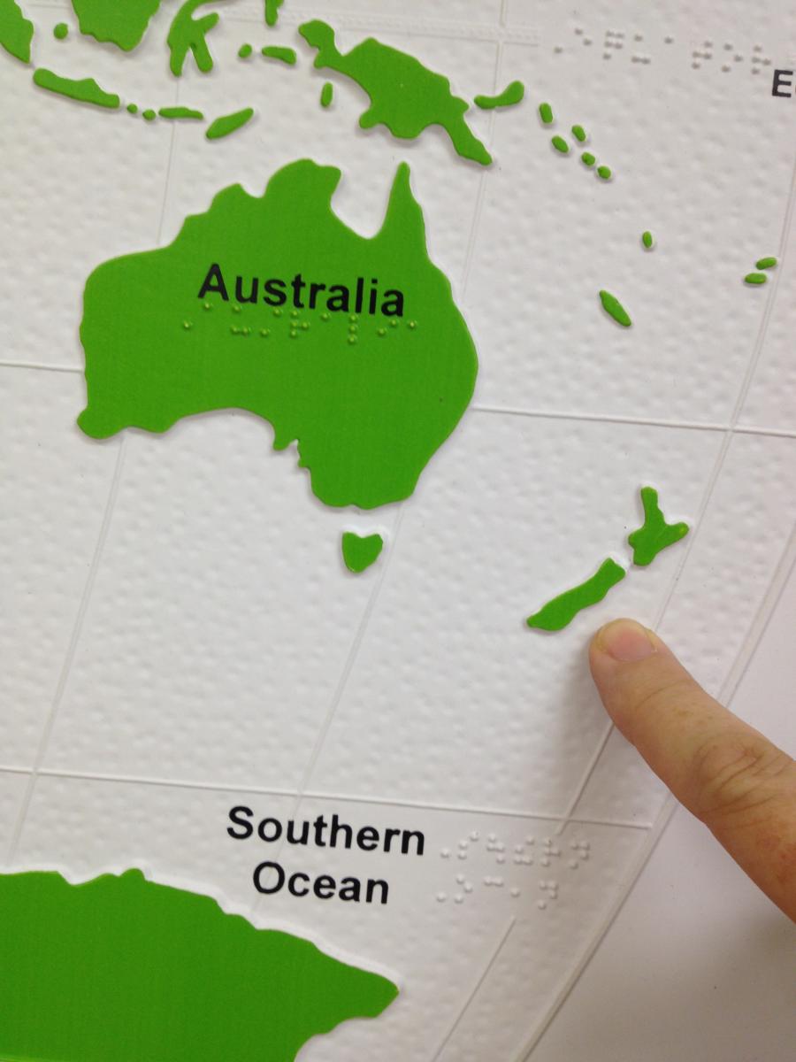 Pointing to New Zealand