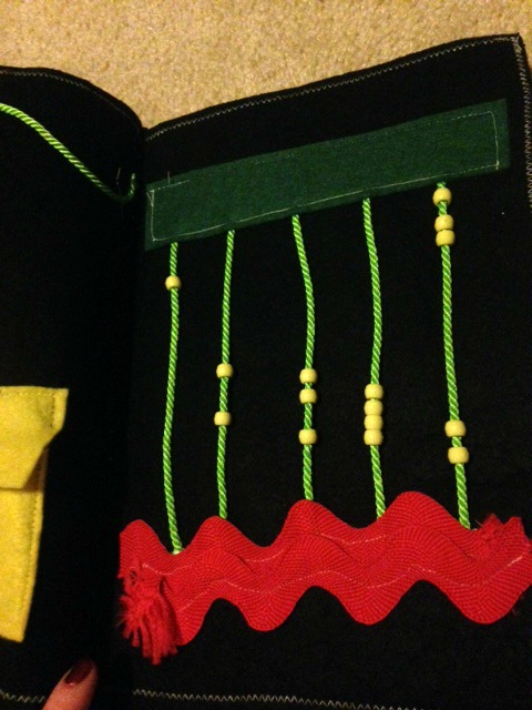 liam's quiet book with green string