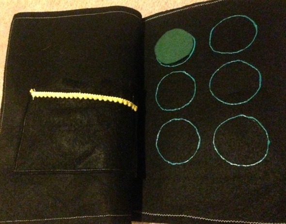 liam's quiet book with braille dots