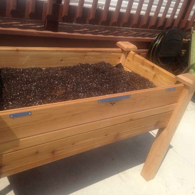 Raised bed with braille labels