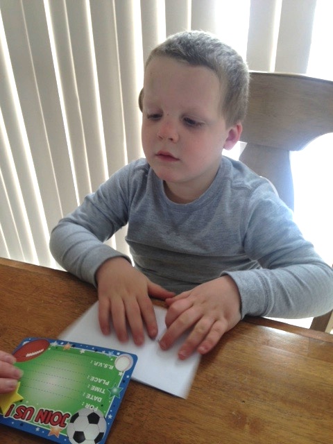 Reading the braille invitation Reading the braille invitation
