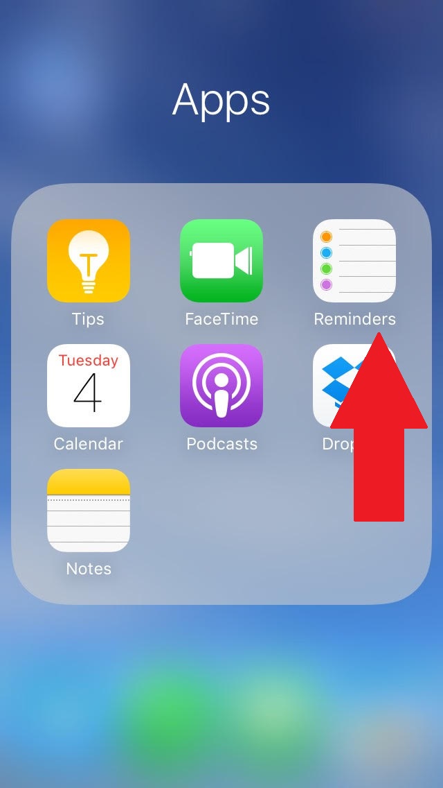 a iphone screen with an arrow pointing to the reminders icon