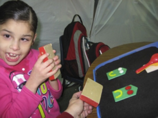 student exploring instruments