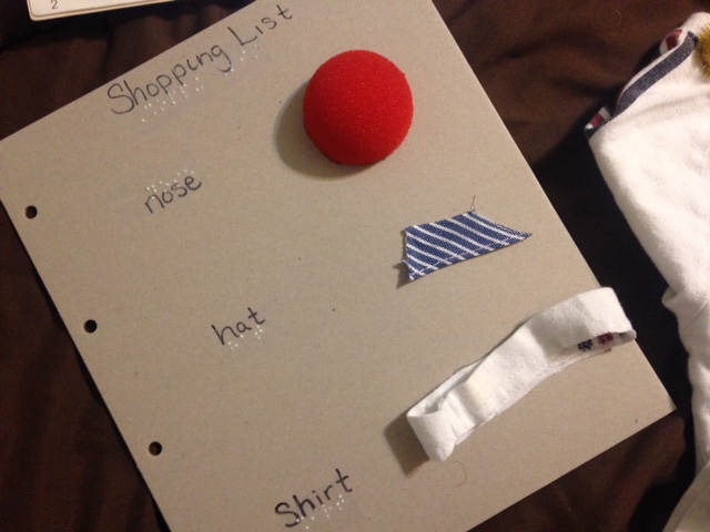 Shopping list with partial objects and braille Braille shopping list with tactile objects