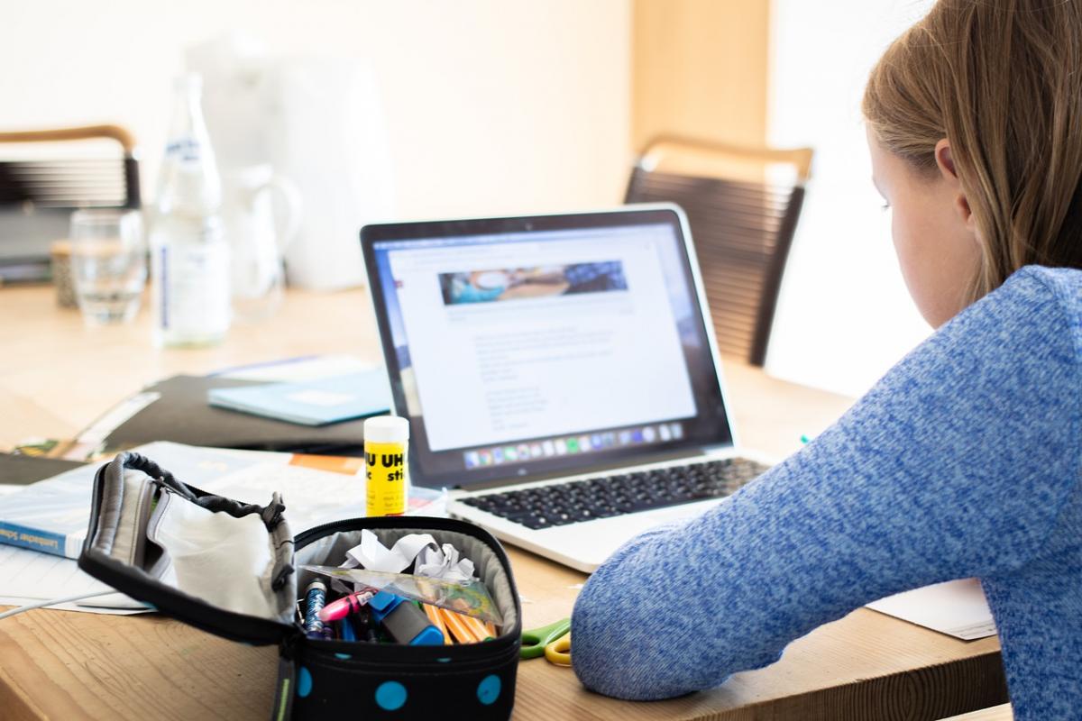 a girl using a laptop