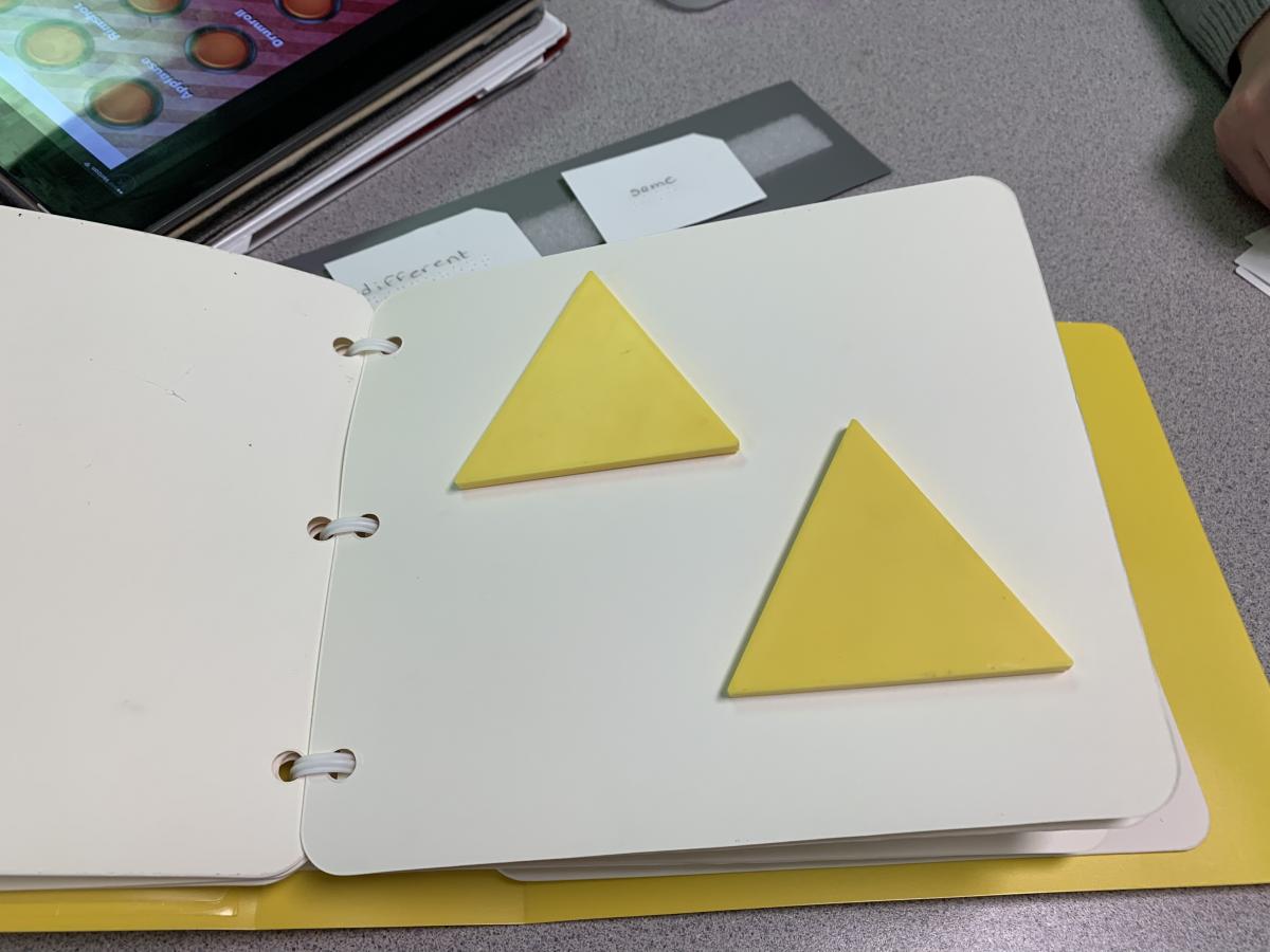 Shape Book page with two yellow triangles Shape Book page with two yellow triangles
