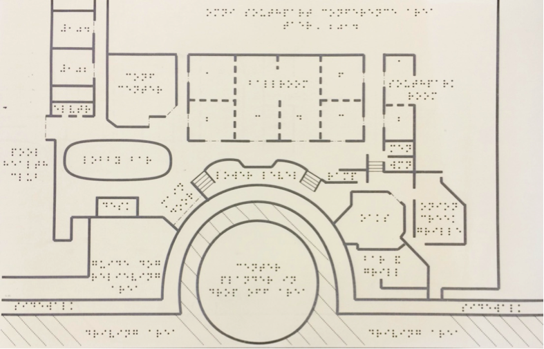  Tactile map on swell paper with floor plan that includes braille map title and room labels