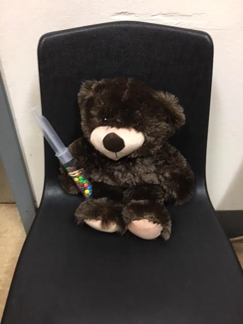Another Teddy bear with syringe of M & Ms Another Teddy Bear with syringe of M & Ms
