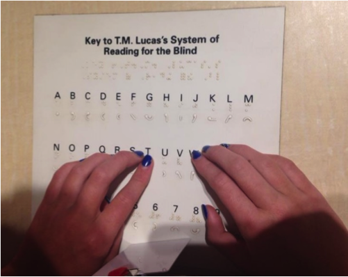 Hands on braille document 