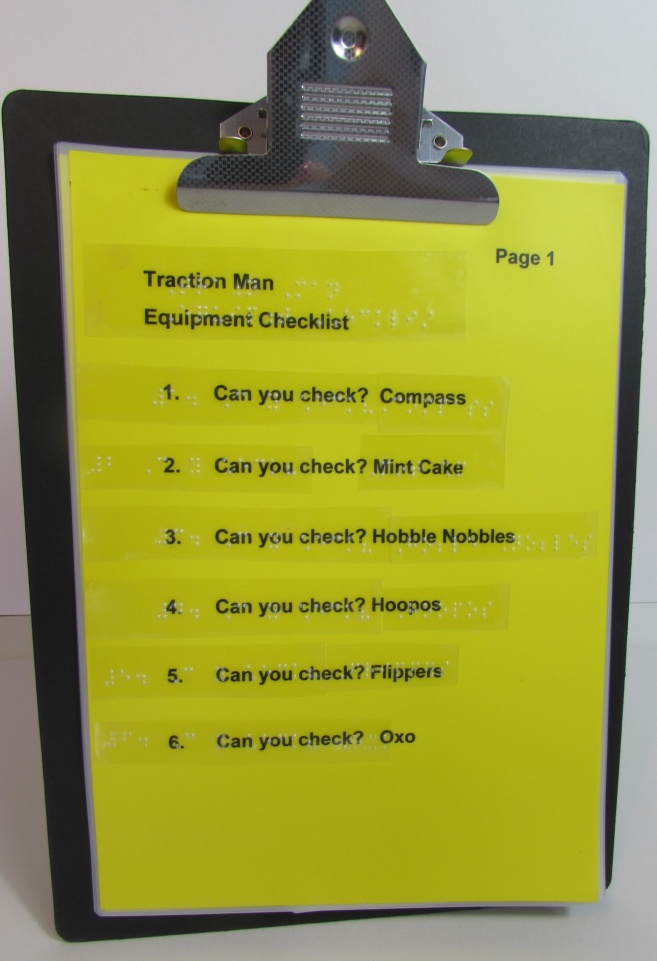 Traction Man's equipment list on a clipboard