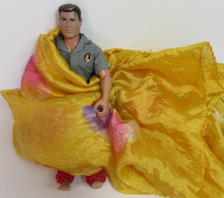 Traction man wrapped in a yellow sarong