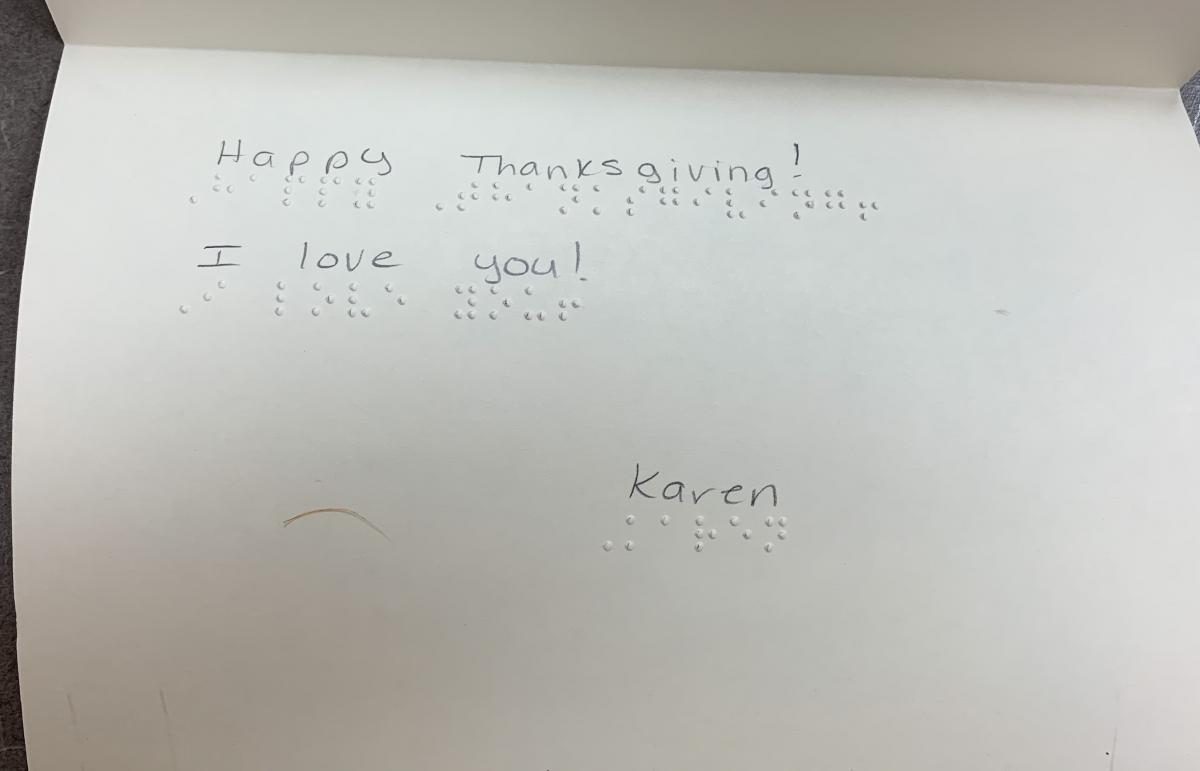 Braille card with text:  Happy Thanksgiving!  I love you! Karen