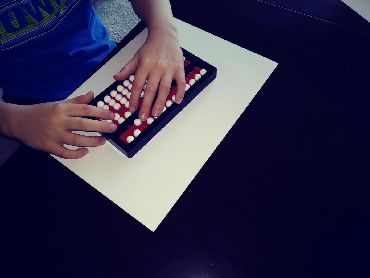 A student using the Cranmer abacus