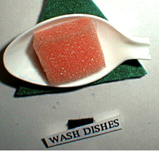 Tactile symbol for washing dishes