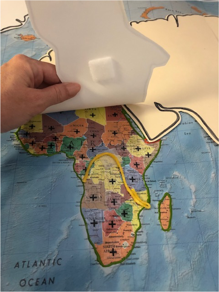 Yellow puff paint on map of Africa