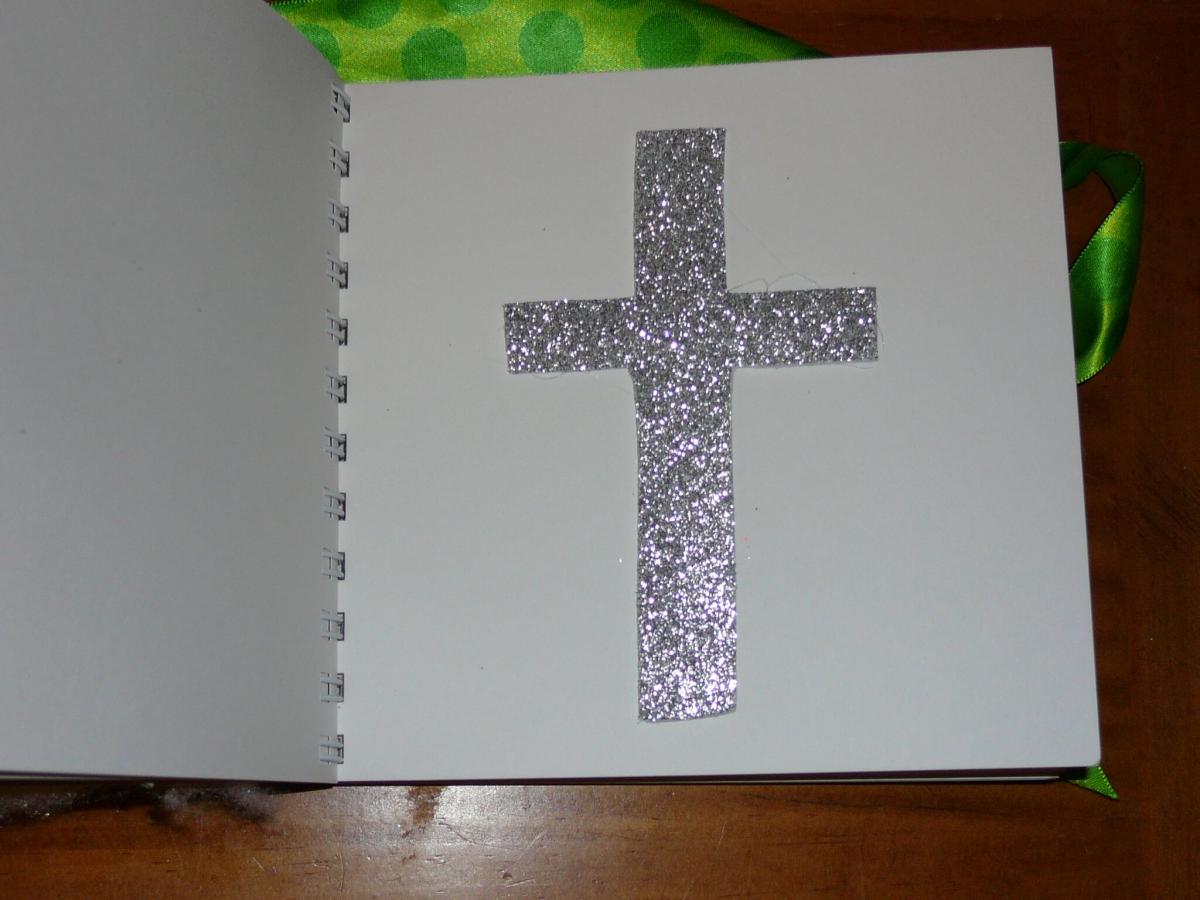 Page with glitter cross