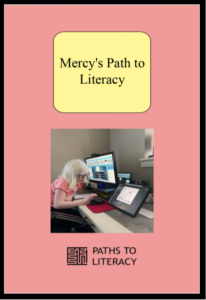 Mercy's Path to Literacy title and a picture of her at her desk looking at her large screen computer.