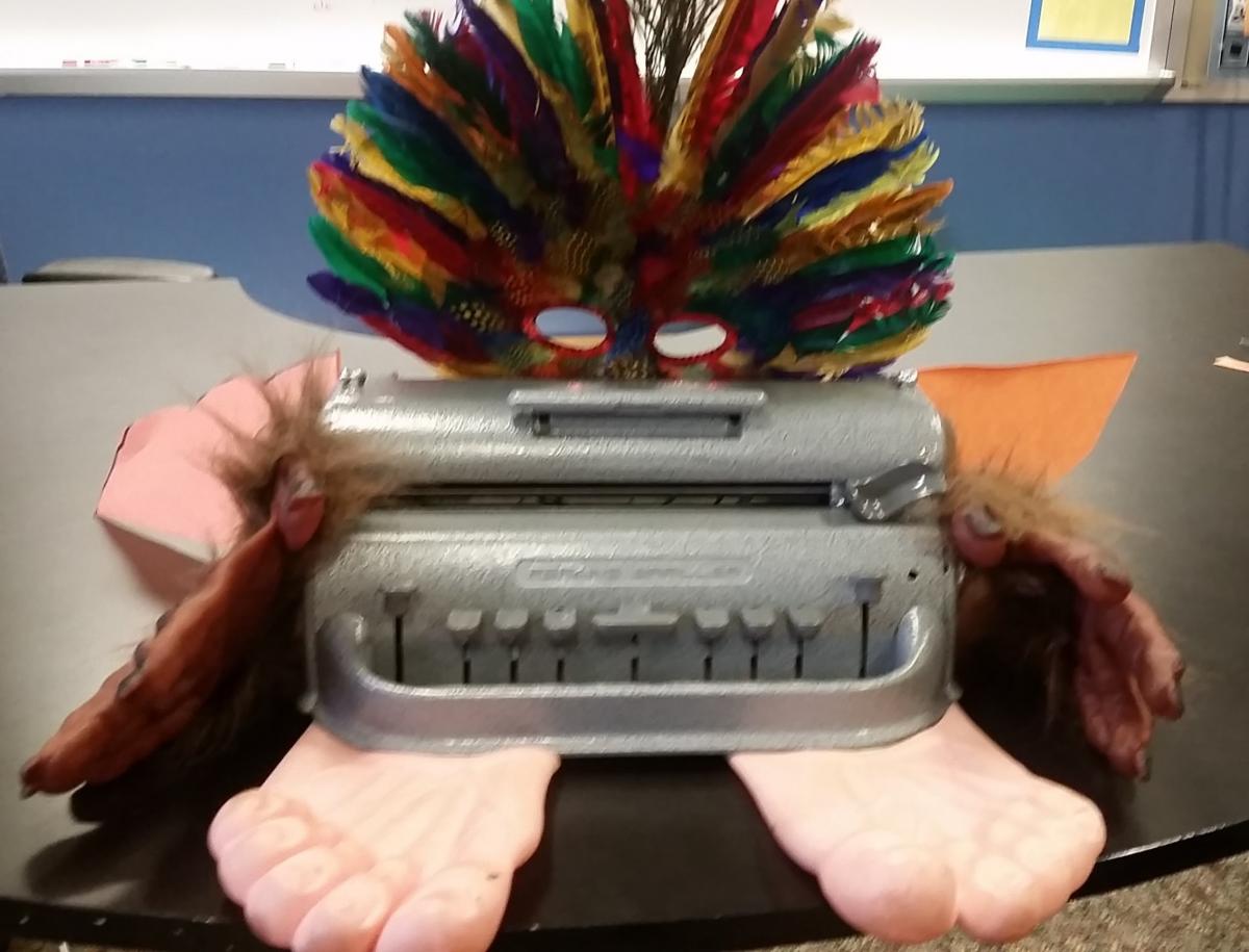 Braillewriter with feathered mask and plastic feet