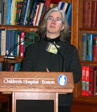 Photo of Evelyn Kelso behind podium at Children's Hospital, Boston