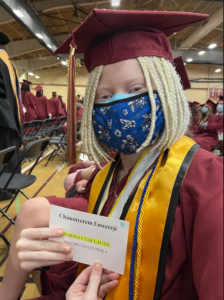 Noye in her cap and gown at Kutztown University graduation.