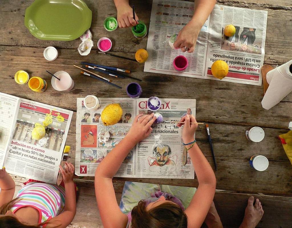 Students painting objects