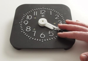 Analog clock with braille from APH.