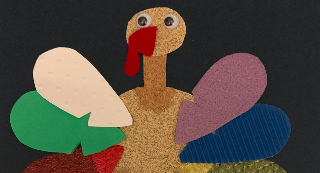 Tactile Turkey has different textured feathers with googly eyes and textured body. 