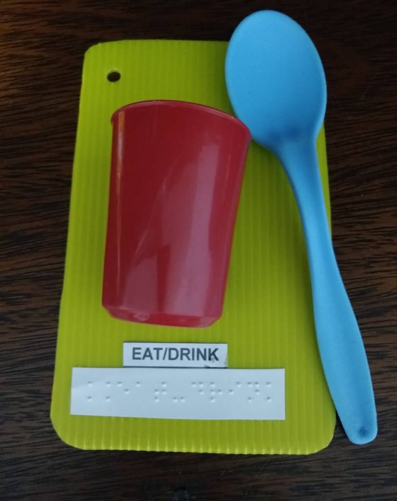 Cup and Spoon, with words eat/drink under it. card.