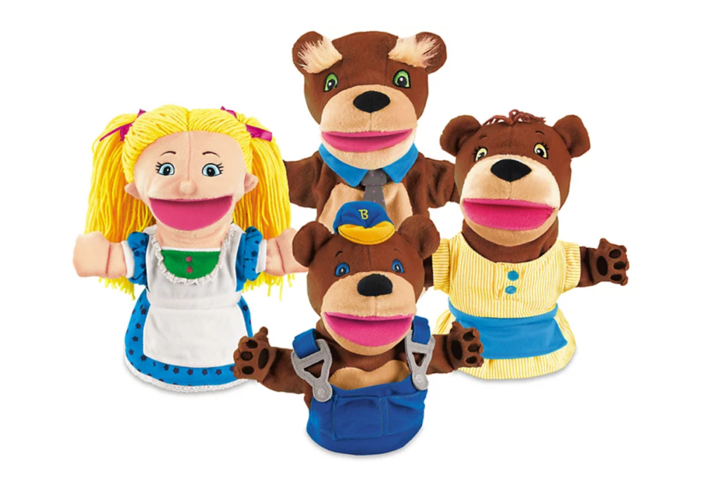 Photo of soft puppets- Goldilocks, Mama, Papa, and baby bear. 